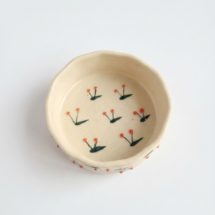 Ceramic bowl with floral patterns on a white background