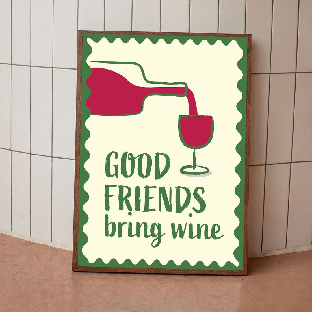 Framed poster with wine-themed design and text 'Good friends bring wine' on a tiled wall.