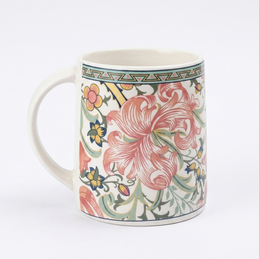 Decorative mug with floral pattern on a white background