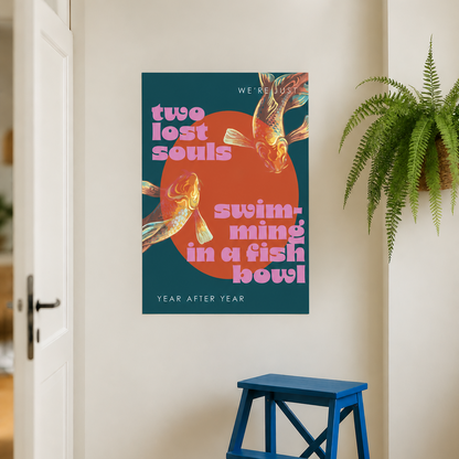 A retro-style poster featuring two goldfish swimming in a fish bowl with the text 'two lost souls swim-ming in a fish bowl' and 'YEAR AFTER YEAR', displayed on a beige wall in a hallway next to a blue step stool and a green potted plant.