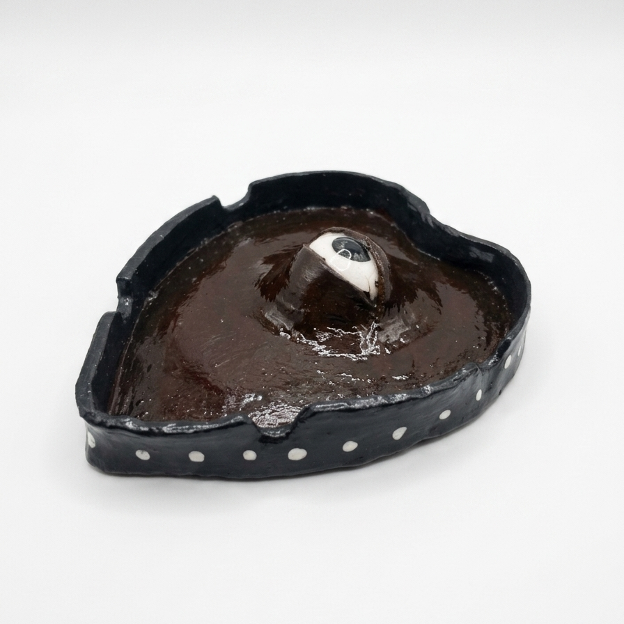 Protruding eye ashtray