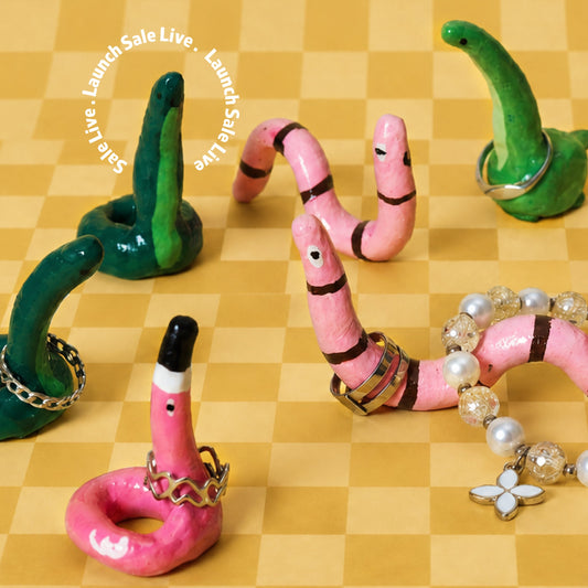 Handcrafted Ceramic Ring Holder Collection – Choose any 2 from our Dino, Flamingo, and Sitting Dinosaur designs. Perfect for organizing your rings with a touch of playful style.