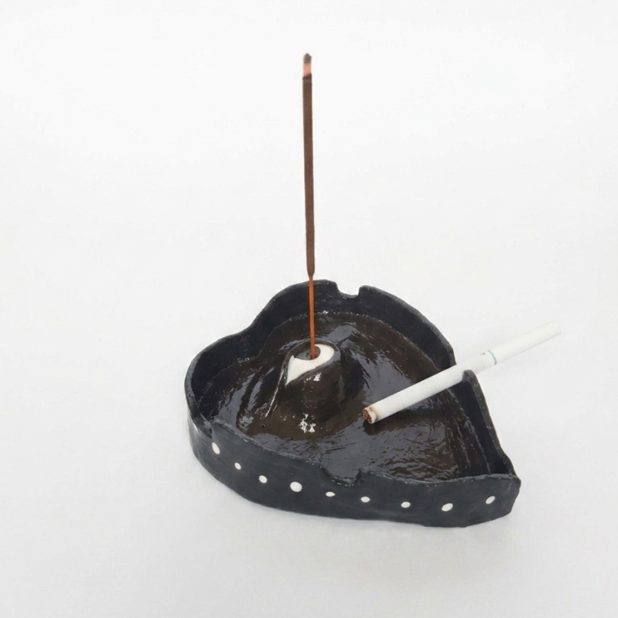 Single left side view of ashtray