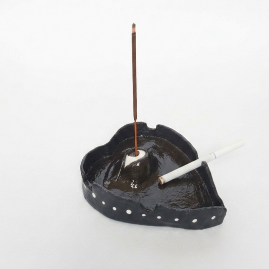 Single left side view of ashtray