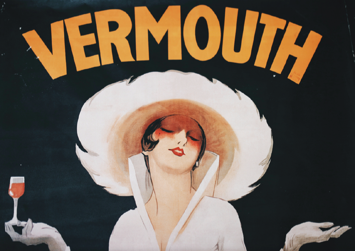 Vintage-style advertisement for vermouth with a woman in a white dress and large hat.