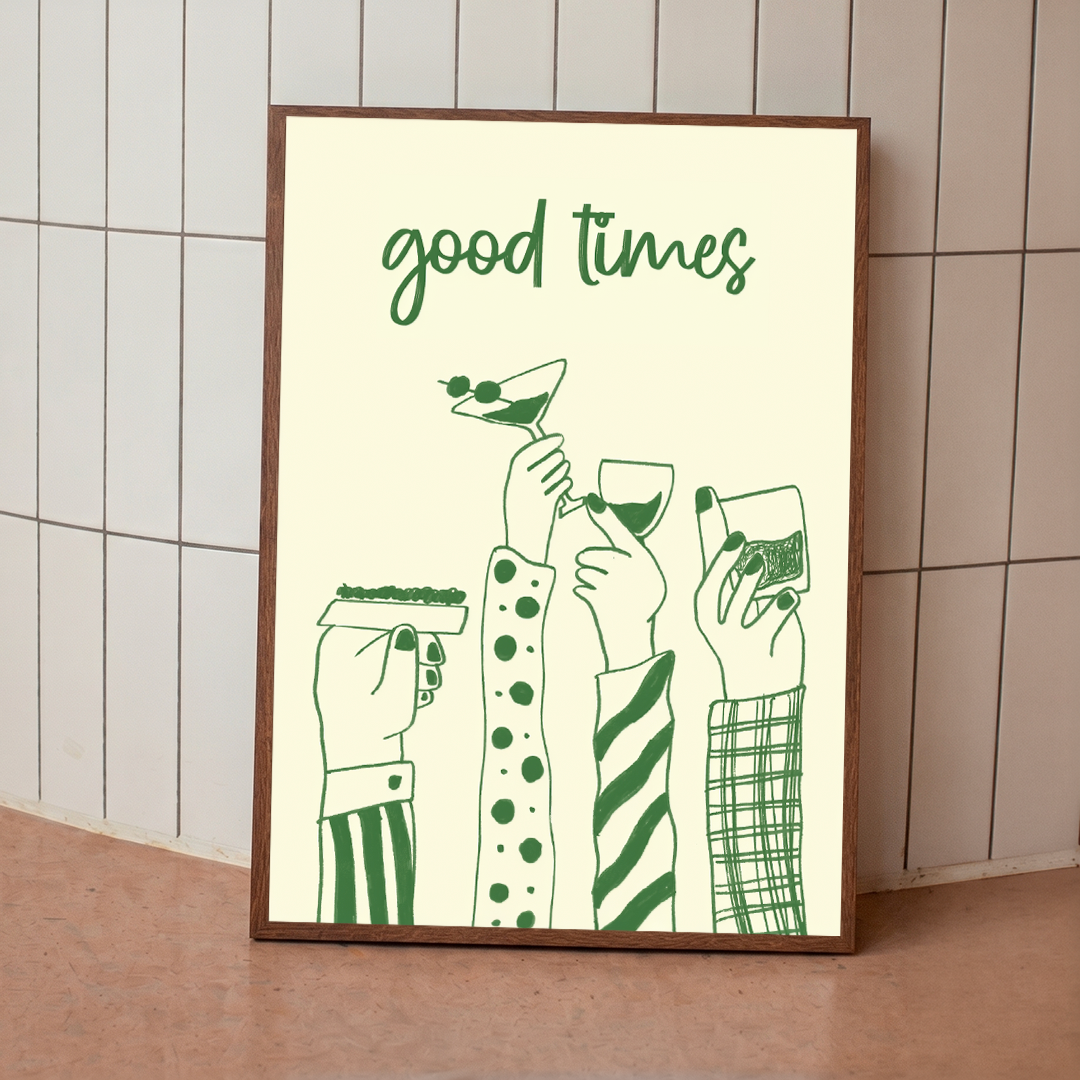Framed artwork with 'good times' text and green illustrations of hands holding drinks against a tiled wall.