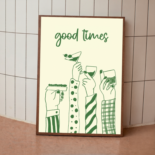 Framed artwork with 'good times' text and green illustrations of hands holding drinks against a tiled wall.
